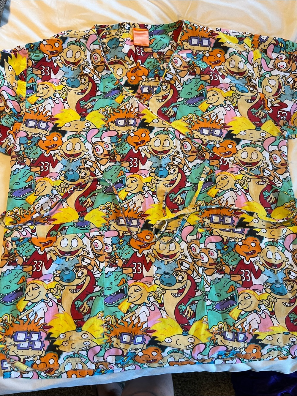 Womenâs Nickelodeon Rugrats Scrub Top - Size Large